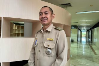 Camat Kota Bangun Darat, Zulkifli.